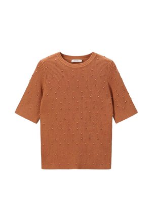 Short-sleeve, ribbed knit top in burnt orange, featuring textured bumps and beading accents throughout the fabric. Round neckline.