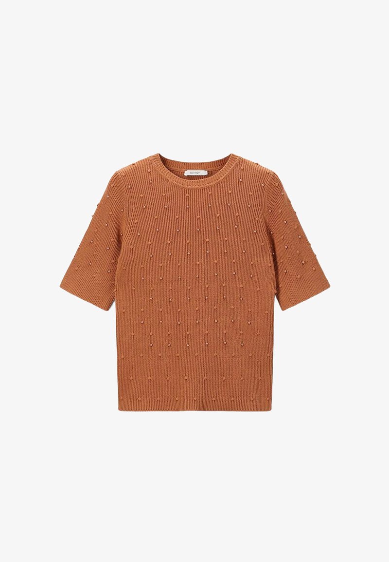 T-shirt à manches courtes en tricot côtelé orange brûlé, avec des bosses texturées et des accents de perles sur tout le tissu. Encolure arrondie.