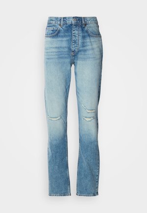 Women’s mid-rise blue jeans with faded wash, distressed tears on both knees, straight-leg cut, and classic five-pocket design.
