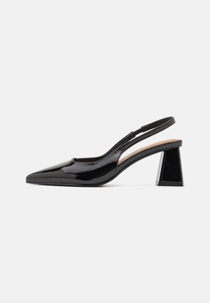 Black patent slingback heels with a pointed toe, featuring a unique geometric block heel and a smooth texture. Adjustable strap for support.