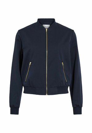 Veste bomber bleu marine avec fermeture éclair dorée sur le devant, poches latérales zippées, col, poignets et ourlet côtelés.
