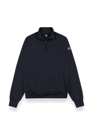 Navy pullover sweater with a half-zip neckline, ribbed cuffs and hem, soft fabric, and a circular logo on the left sleeve.