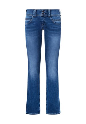 Siniset denim-buutsit-housut, joissa etutaskut, kaksinkertainen napitus ja lievää haalistumista reisissä ja polvissa.