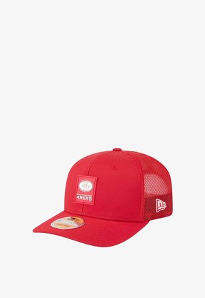 Red baseball cap with mesh panels, featuring a rectangular San Francisco 49ers logo patch on the front and a flat brim.