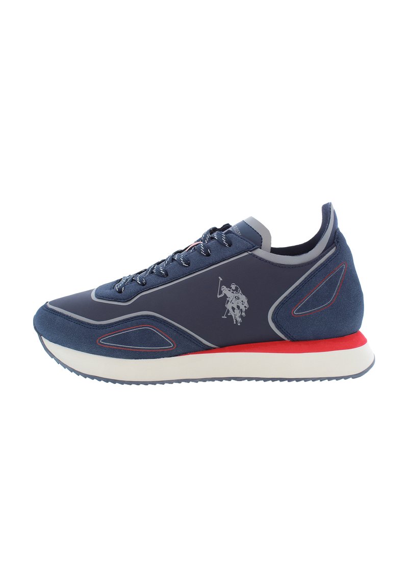 Navy athletic shoe featuring a suede and mesh upper, textured paneling, grey accents, red midsole, and embroidered logo detail on the side.