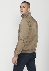 Koroshi Geacă bomber - beige