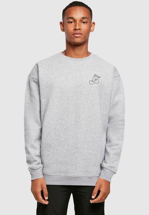 Gray sweatshirt made of cotton blend, featuring a crew neck, long sleeves, and a black cherry graphic on the chest. Soft texture, relaxed fit.