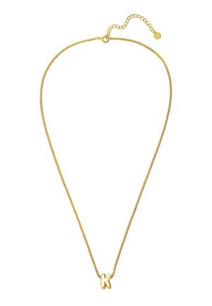 Collana in metallo dorato con una catena a scatola sottile e un pendente a forma di lettera "K". Lunghezza della catena regolabile con un piccolo gancio.