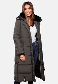 Padded dark green coat with a black faux fur collar, full zip, and side pockets, featuring ribbed cuffs and brand label on the hem.