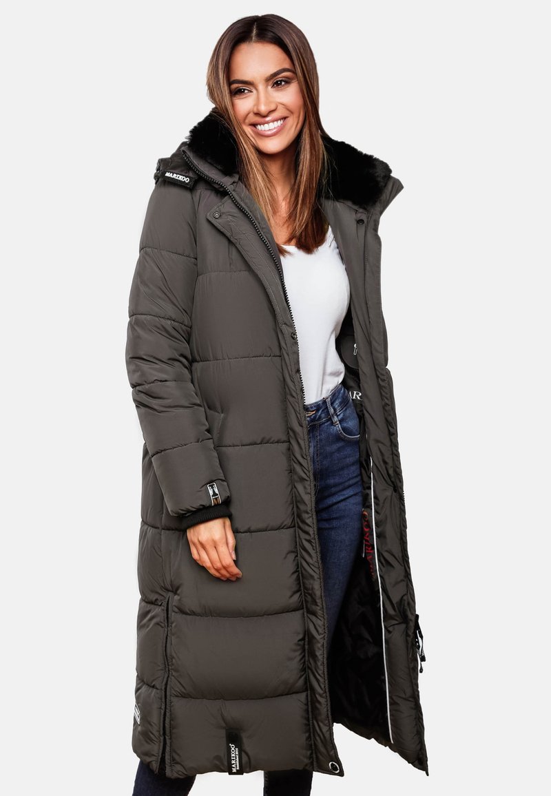 Padded dark green coat with a black faux fur collar, full zip, and side pockets, featuring ribbed cuffs and brand label on the hem.