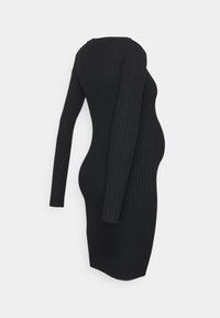 Abito a coste nere con maniche lunghe, silhouette aderente, lunghezza a metà coscia e scollatura a girocollo, progettato per l'abbigliamento maternità.