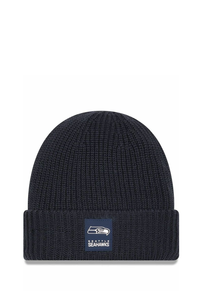 Navy knit beanie with a ribbed design and a folded cuff, featuring a square logo patch for the Seattle Seahawks on the front.