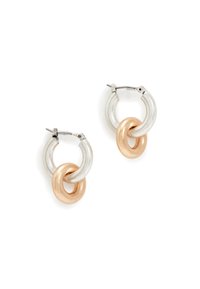 Hoop earrings featuring a combination of metallic silver and rose gold circles. Sleek design with a polished texture and a simple clasp.