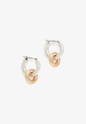 Orecchini a cerchio con una combinazione di cerchi in argento metallizzato e oro rosa. Design elegante con una texture lucida e una chiusura semplice.