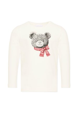 Crèmekleurig shirt met lange mouwen met een gedetailleerd grijs teddybeergezicht met een rood-wit patroon sjaal bedrukt op de voorkant.