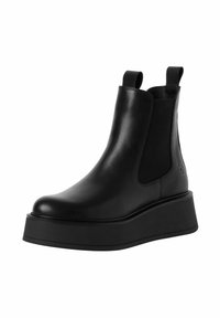Black leather ankle boot with elastic side panels, rounded toe, slip-on design, and thick platform sole for added height.