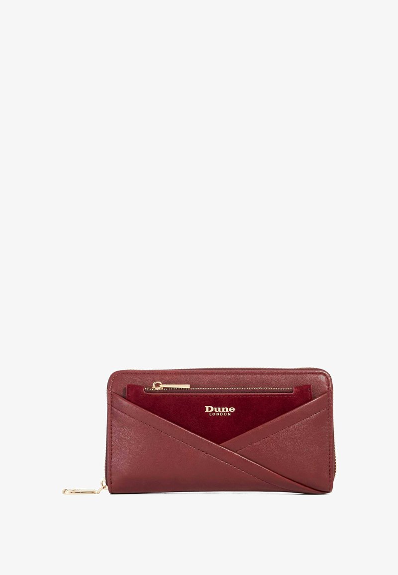 Burgundy leather wallet with diagonal design, featuring a gold zipper pocket and embossed "Dune London" logo. Smooth and textured accents.