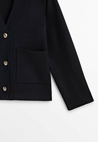 Navy knit cardigan with a V-neck, featuring a single pocket and six gold-tone buttons. Ribbed sleeve cuffs and hem. Soft texture.