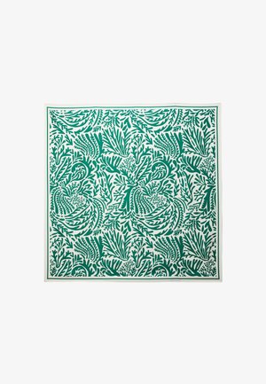 Tissu vert et blanc à motifs avec des designs de feuillage complexes. Le motif présente différentes formes de feuilles avec une texture lisse.