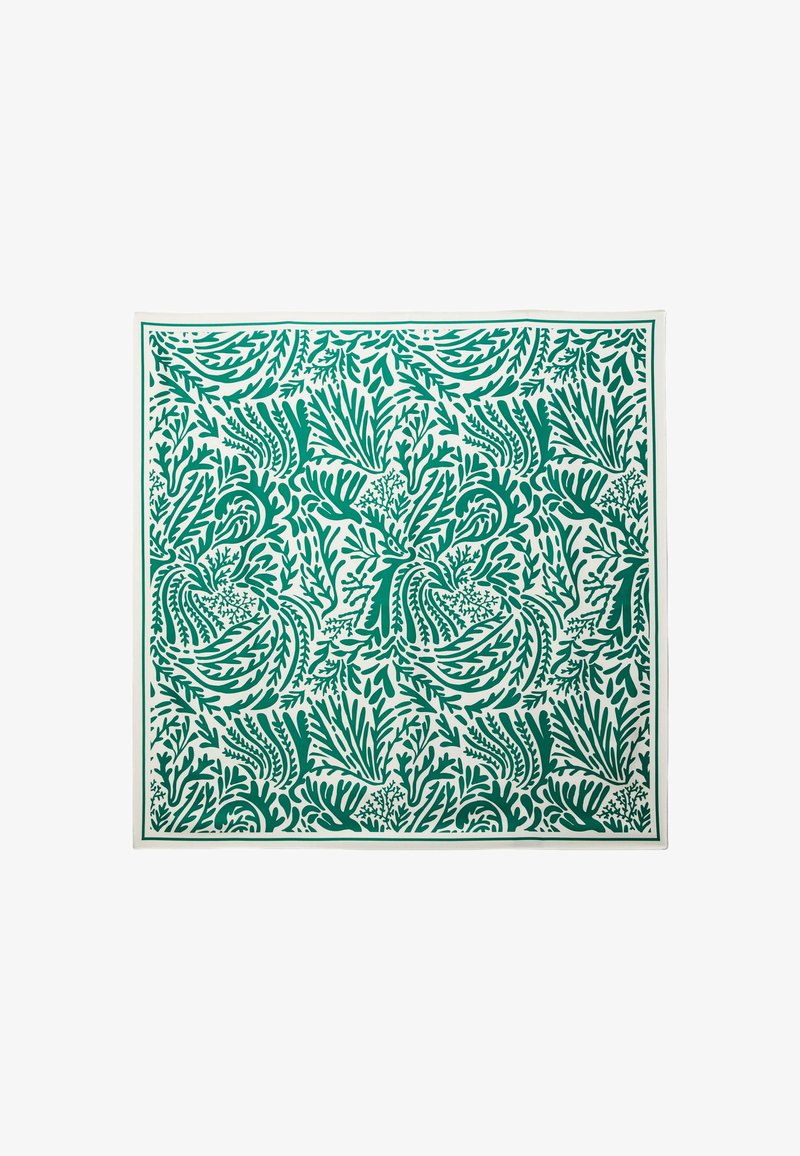 Tissu vert et blanc à motifs avec des designs de feuillage complexes. Le motif présente différentes formes de feuilles avec une texture lisse.