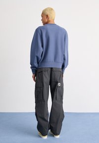 Carhartt WIP AMERICAN SCRIPT - Sweatshirt - positano