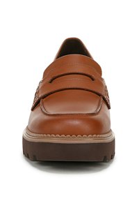 Brown leather loafers with two strap accents, a thick treaded sole, and decorative stitching around the edges. Smooth texture throughout.