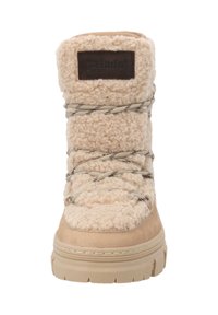 Stivale beige con tomaia dalla trama pelosa, design con lacci, suola in gomma e una piccola etichetta con marchio sul lato.