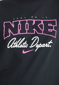 Black cotton t-shirt featuring bold pink "NIKE" logo, white "Athletic Depart." text, and small pink Nike swoosh. Classic crew neckline.