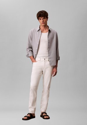 - Jeansy Straight Leg