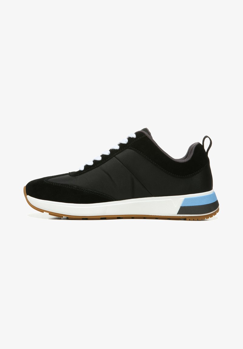Black sneaker with suede and fabric materials, white laces, contrasting blue and black accents, and a textured rubber sole.