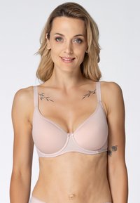 Jasnoróżowy, wyściełany stanik z fiszbinami i regulowanymi ramiączkami. Gładki materiał z subtelnym połyskiem oraz małym detalem w postaci kokardki na środku.