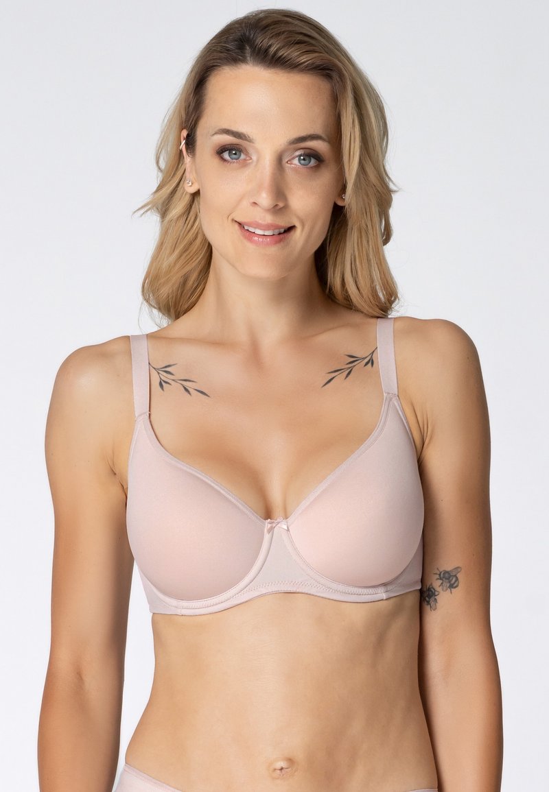 Jasnoróżowy, wyściełany stanik z fiszbinami i regulowanymi ramiączkami. Gładki materiał z subtelnym połyskiem oraz małym detalem w postaci kokardki na środku.