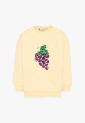 Felpa a maniche lunghe color crema con un grande motivo di grappolo d'uva viola con paillettes e foglie verdi sul davanti.