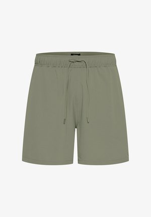 Šviesiai alyvuogių spalvos maudymosi šortai su elastinga juosta, virvutės užsegimu ir sklandžia, minkšta tekstūra. Paprastas dizainas be raštų.