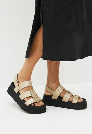 Sandalias con plataforma - gold textured