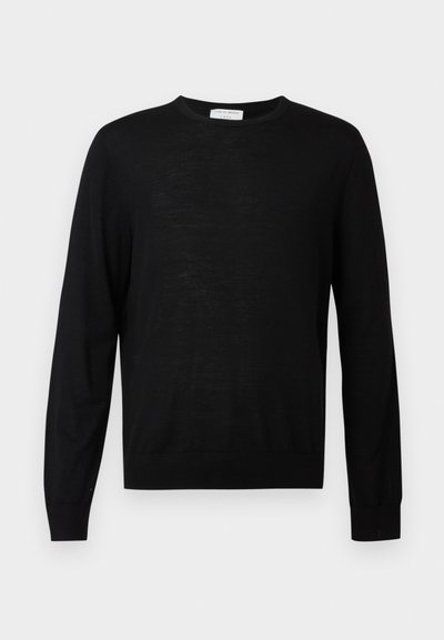 Sort langærmet sweater lavet af blødt stof, med rund halsudskæring, ribbede manchetter og lige kant. Minimalistisk design, ingen mønstre.