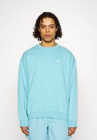 Levi's® Gold Tab CREW - Športni pulover - milky blue