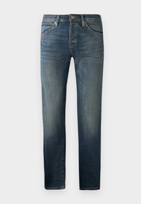 Jeans ajustados de tela vaquera, con un lavado azul medio, cinco bolsillos y costuras decorativas en las costuras.