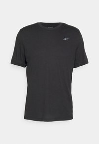 T-shirt nero a maniche corte realizzato in un tessuto morbido. Collo a giro con un discreto logo Reebok grigio sulla parte sinistra del petto.