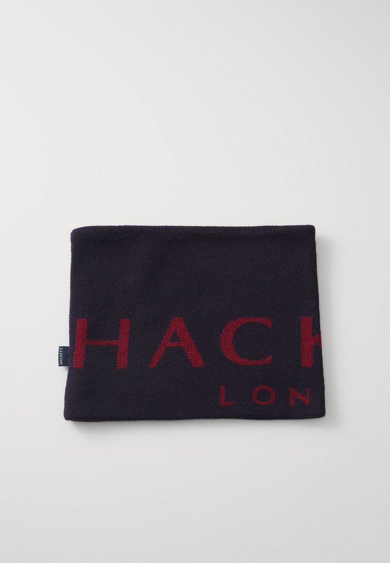 Knitted dark navy scarf featuring bold red lettering "HACKETT LONDON," with a soft texture and rectangular shape. Includes a small fabric tag.