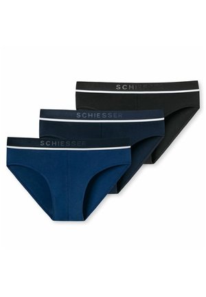 Schwarze kurze Unterwäsche mit einem dehnbaren Bund, der einen kontrastierenden weißen Streifen und ein Logo aufweist. Glattes Material mit figurbetontem Schnitt.