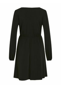 Robe noire à manches longues jusqu'au genou avec une taille cintrée et un col rond, vue de dos sur fond blanc.