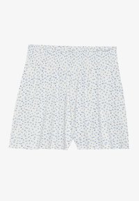 White cotton shorts with a smocked waistband, featuring a small blue floral pattern throughout. Comfortable, loose-fitting design.