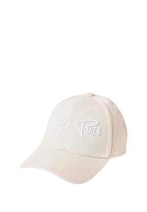 Casquette de baseball beige avec une visière courbée et un texte brodé blanc "Project X Paris" sur le panneau avant.