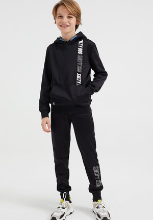 MET TAPEDETAIL - Collegepaita - black