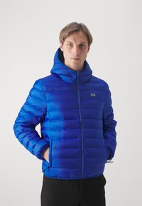 Lacoste Outdoorová bunda - bleu