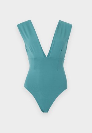 Tyrkysový jednodielny plavky s hlbokým výstrihom do V a širokými ramennými popruhmi, zobrazené na bielom pozadí.