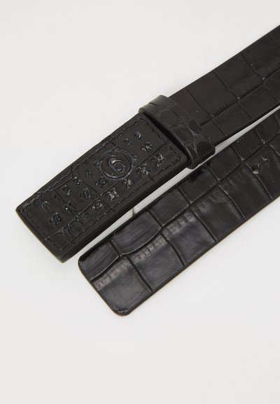 Black leather belt featuring a crocodile texture, with embossed numbers for sizing on the buckle and a smooth finish on the strap.