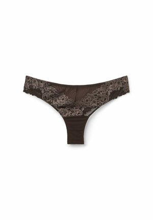 String noir en dentelle avec motifs floraux et tissu transparent, conçu pour les sous-vêtements intimes féminins.