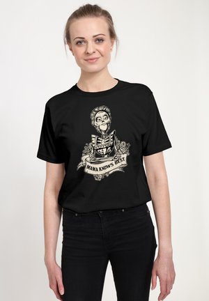 Black t-shirt featuring a vintage skeleton design with "MAMA KNOWS BEST" banner, detailed with roses, smooth fabric, and crew neck.